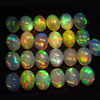 calebrated size 6x8 mm oval - Ethiopian Opal - really - tope grade high quality CABOCHON - oval shape - each pcs - have amazing - beautifull - flashy fire all around in the stone -25 pcs - approx -- STUNNING QUALITY - VERY VERY RARE